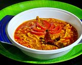 A picture of step 5 of Sev tamatar sabji.