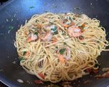 A picture of step 4 of Garlic Tomato Shrimp Pasta.