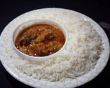 A picture of step 2 of White rice with stew.