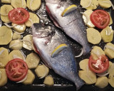 Foto del paso 5 de la receta: Dorada al horno con guarnición 🐟🌻