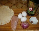 A picture of step 7 of Azerbaijani chicken- onion omelette.