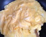 A picture of step 9 of Easy Omurice with Mushroom Demi-Glace Sauce.