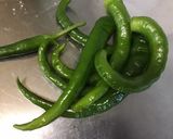 Une image de l'étape 1 de Trio de piments, tomates cerises, ail et herbes aromatiques au vinaigre.