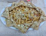 A picture of step 7 of Pink cheese pasta with garlic bread.
