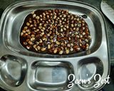 A picture of step 3 of Whole Peanut Laddoos.