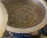 A picture of step 1 of Fried omena(small fish).