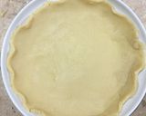 A picture of step 8 of Apple pie with flaky butter crust served with vanilla ice cream.