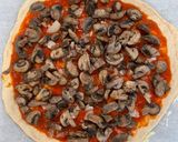 A picture of step 6 of Mushroom Pizza.