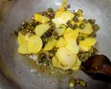 A picture of step 1 of Soak fry aaloo bhindi.