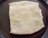 A picture of step 7 of Gozleme / Turkish stuffed flat bread.