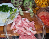Foto del paso 2 de la receta: Arroz con camagroc, secreto, alcachofas..