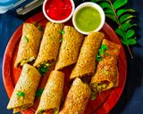 A picture of step 9 of Stuffed Moong Dal Wrap - Veggie & Paneer Stuffed Moong Dal Wrap.