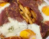Foto del paso 2 de la receta: Huevos rotos con jamón airfryer