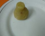 A picture of step 8 of Stuffed Badam kalash.