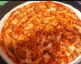 A picture of step 3 of Chicken tikkka pizza.