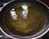 A picture of step 5 of Jalebi with Rabri.