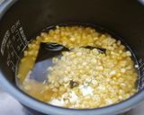 A picture of step 3 of Lightly Buttery Corn and Edamame Rice.