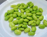 A picture of step 4 of Lightly Buttery Corn and Edamame Rice.