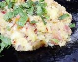 A picture of step 4 of Aloo ka bharta.