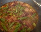 A picture of step 1 of Masala bhari bhindi.