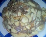 A picture of step 14 of Semolina cookies with chocolate syrup.