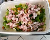 Une image de l'étape 11 de Courgettes et poivrons au lard et épices.
