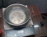 A picture of step 18 of Two In One brown semolina rasgulla.