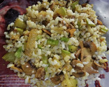 Foto del paso 4 de la receta: Arroz integral con salteado de champiñones y calabacín