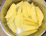 A picture of step 5 of Baked potato wedges.