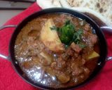 A picture of step 17 of Aloo Qeema.