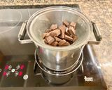 Foto del paso 6 de la receta Pastel con coca de almendras, cabello de ángel y ganaché