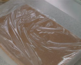 A picture of step 10 of Cocoa Swiss Roll with Chocolate Cream.