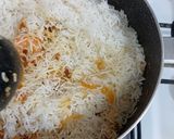 A picture of step 5 of Tom yum shrimp rice.