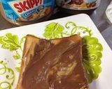A picture of step 2 of Nutella Peanut Butter Toast.