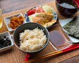 A picture of step 1 of Japanese Breakfast (how to eat Nori seaweed and rice).