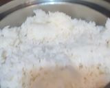 A picture of step 2 of Daki sawal of yesterday rice with fruit ginger, small onion,green chilli and tadka.
