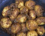 A picture of step 7 of Spicy baby potato curry.