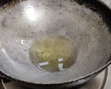 A picture of step 2 of Pizza sauce.