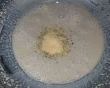 A picture of step 2 of Cheesy garlic bread.