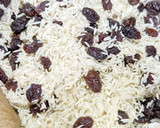 Foto del paso 3 de la receta: Arroz especiado con almendras y pasas