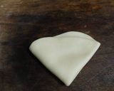 A picture of step 7 of Badam puri.