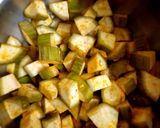 A picture of step 2 of Raw banana masala.
