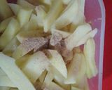 A picture of step 2 of Kfc style chicken garlic fries.
