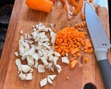 A picture of step 1 of Egg Fried Rice with Mushrooms and Carrots.