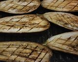Foto del paso 4 de la receta: Berenjenas rellenas de pollo, jamón y salchichas al horno