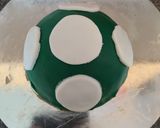 A picture of step 10 of Super Mario Mushroom Cake.