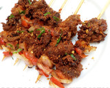 A picture of step 8 of Tsire Skewers.