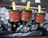 A picture of step 2 of Watermelon popsiles.
