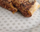 A picture of step 4 of Homemade Ground Beef and Cheddar Burrito.