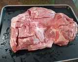 A picture of step 1 of Hearb roasted leg of lamb roll with potatoes and carrots.